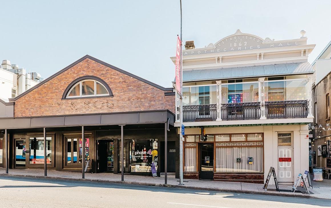 Image of two heritage buildings on a Brisbane street