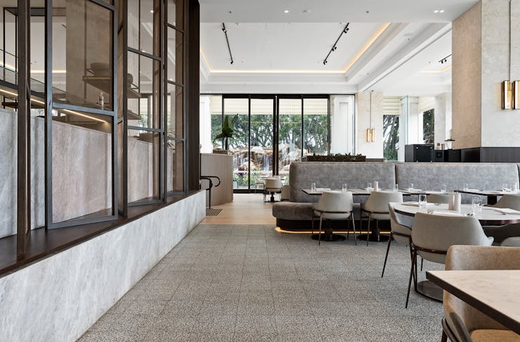 the slate grey dining room interior of a luxury resort