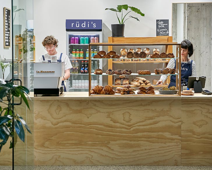 People behind the counter at RÃ¼di's Bakehouse in Hamilton.