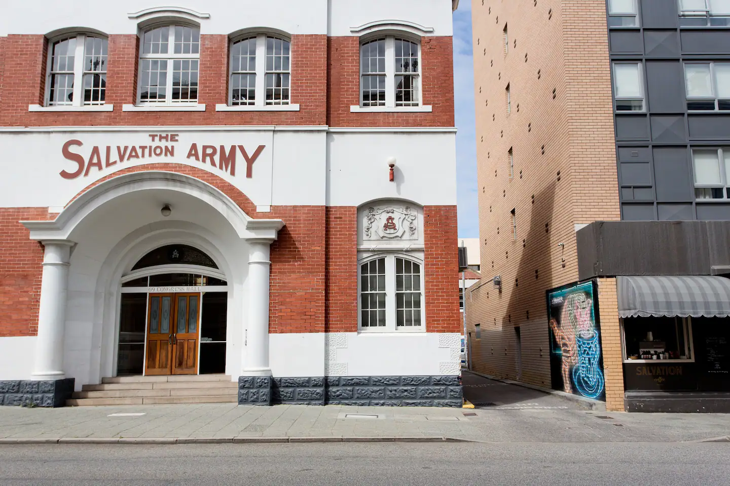 Outside view of the red and white Salvation Army Heritage building