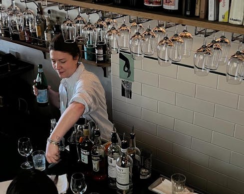The wine bar with hanging glasses at 10 William St Paddington
