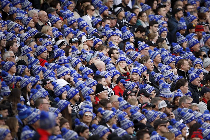 A crowd full of spectators wearing blue FightMND beanies.