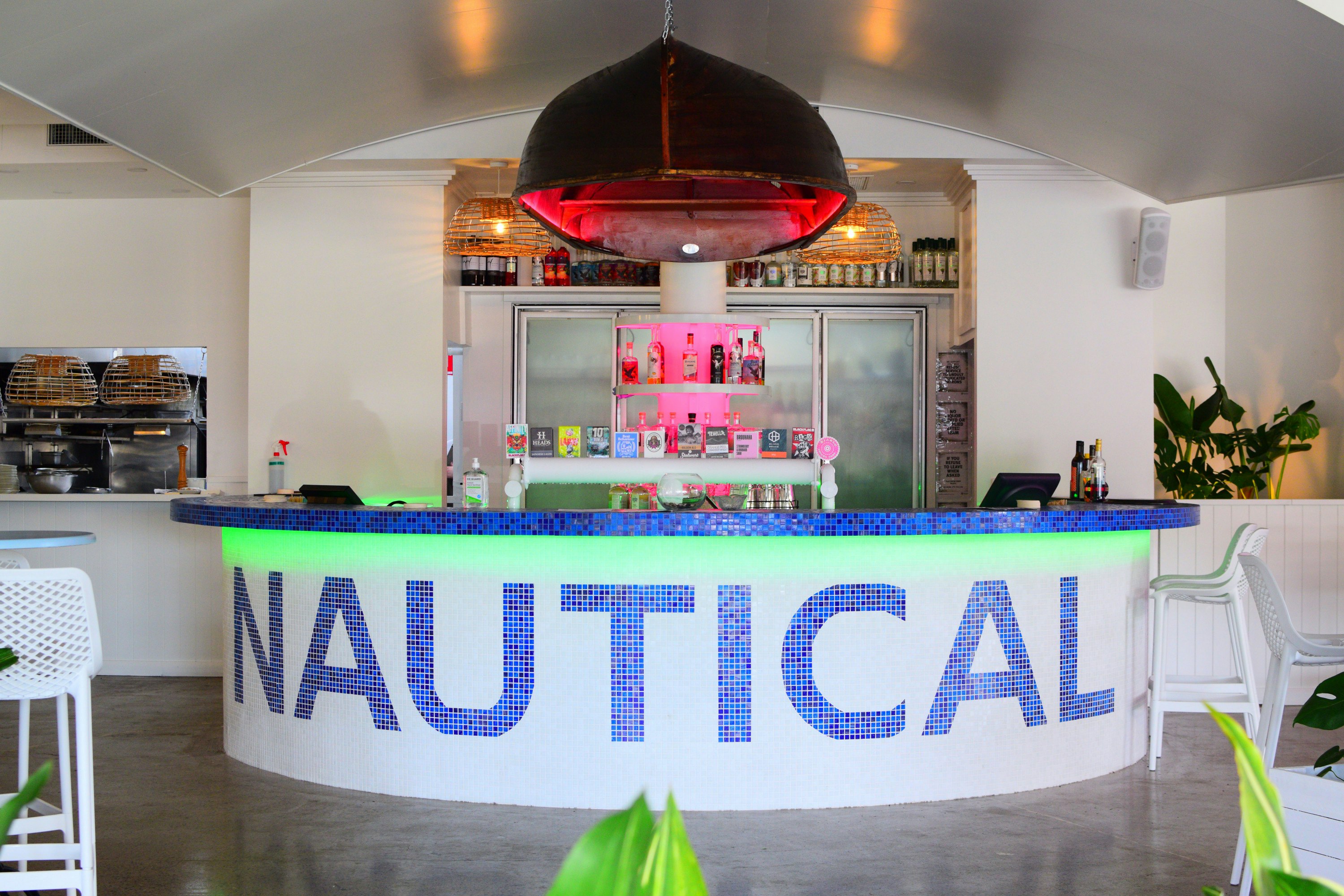 a white bar with a navy blue mosaic design that says 'nautical'