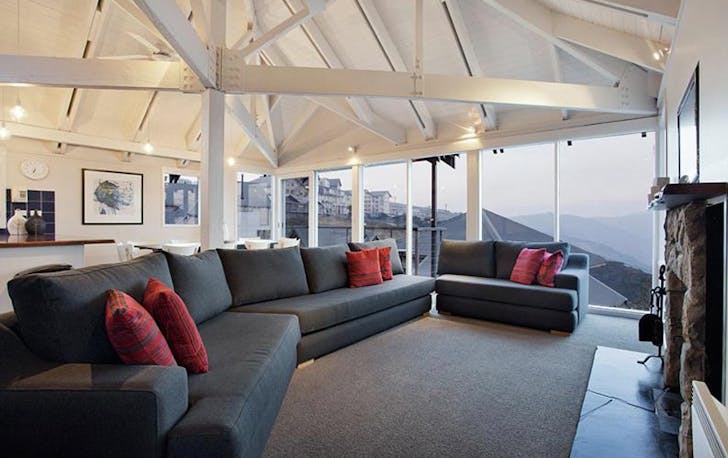 A large open-living dining and lounge room, a mt hotham accommodation option.
