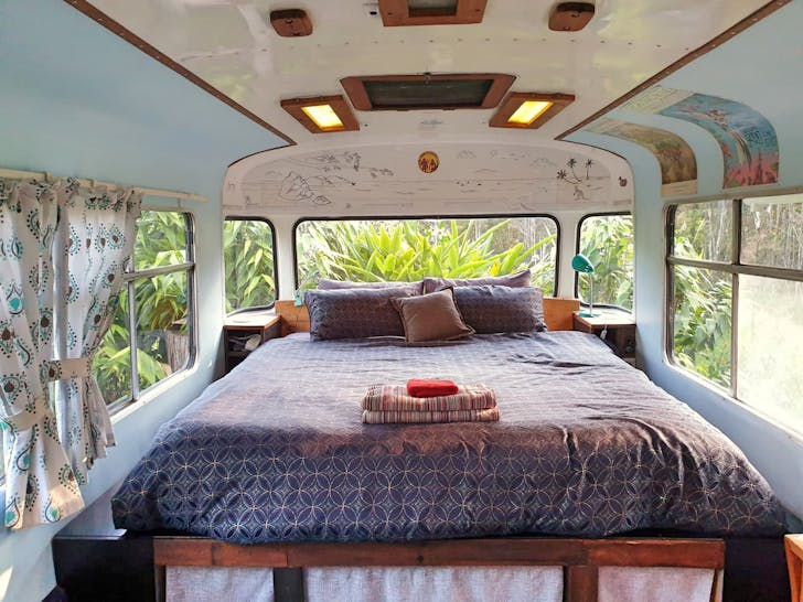 a large bed inside a bus