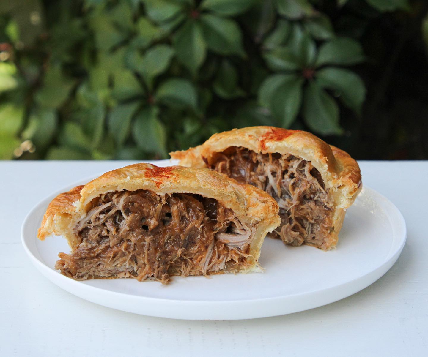 a halved meat pie