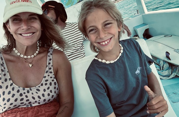 Mother and son in boat bali