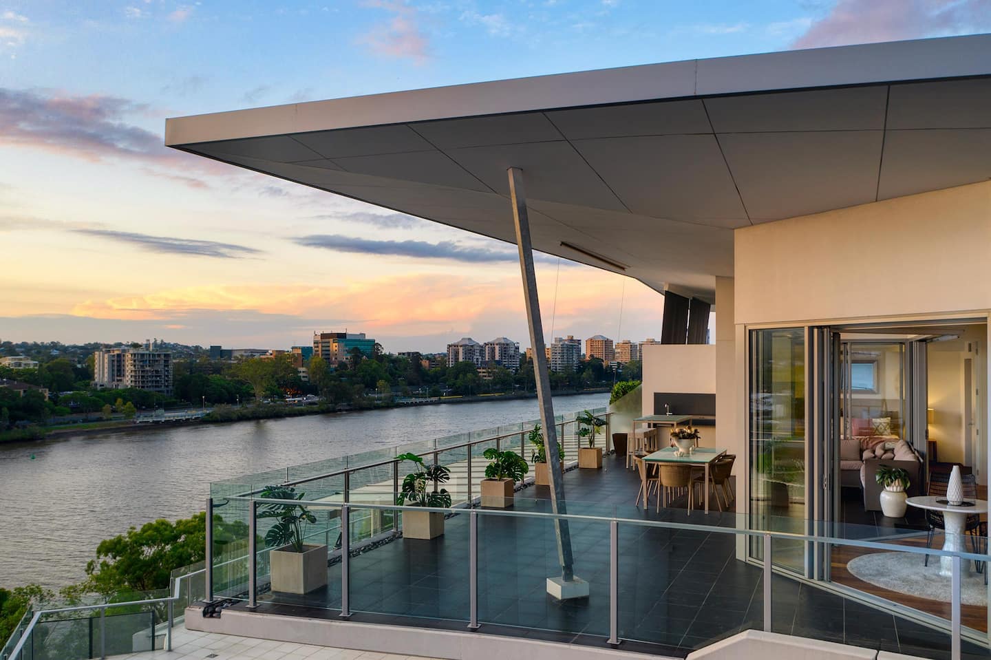 a penthouse apartment overlooking the river
