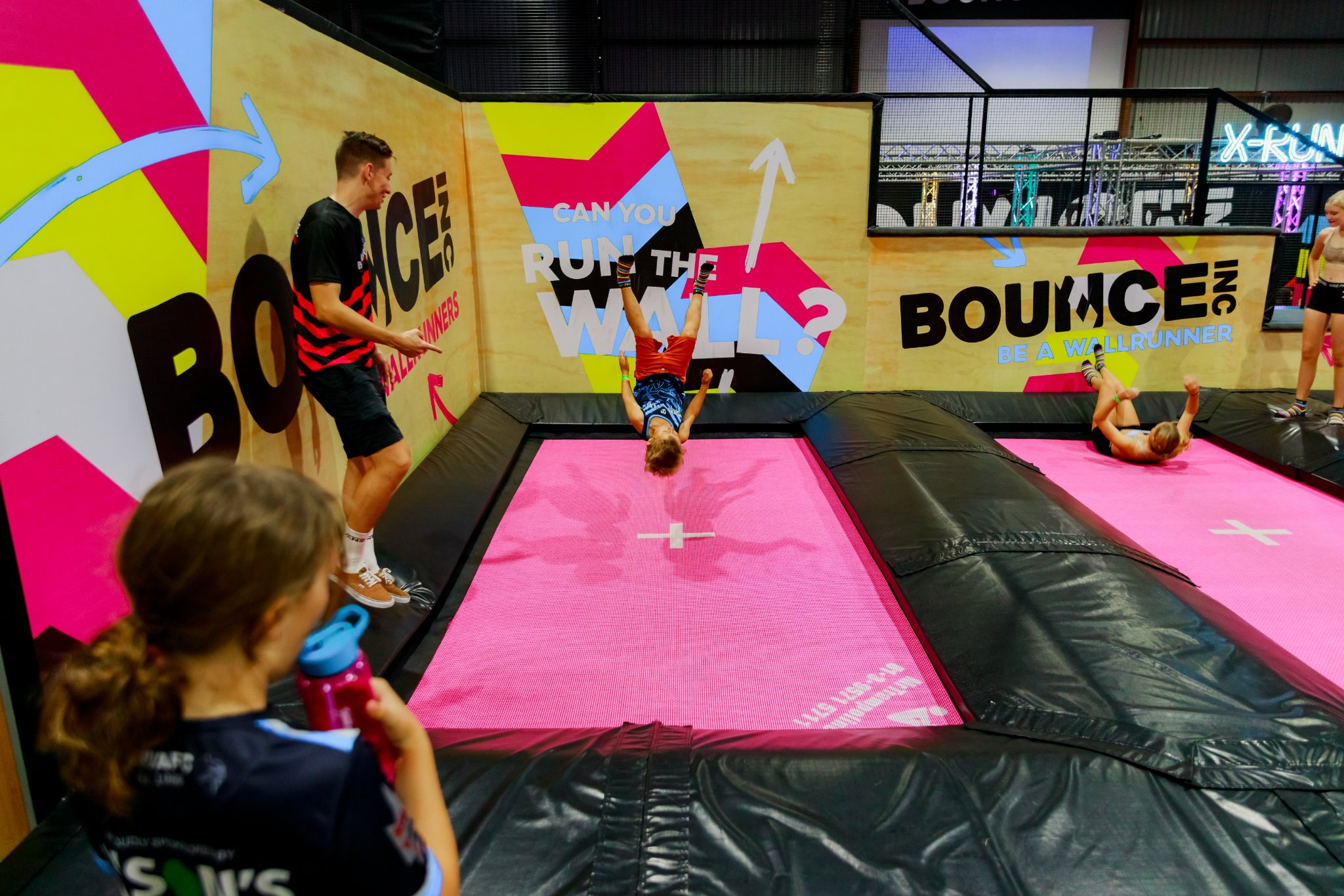 kids jumping on trampolines