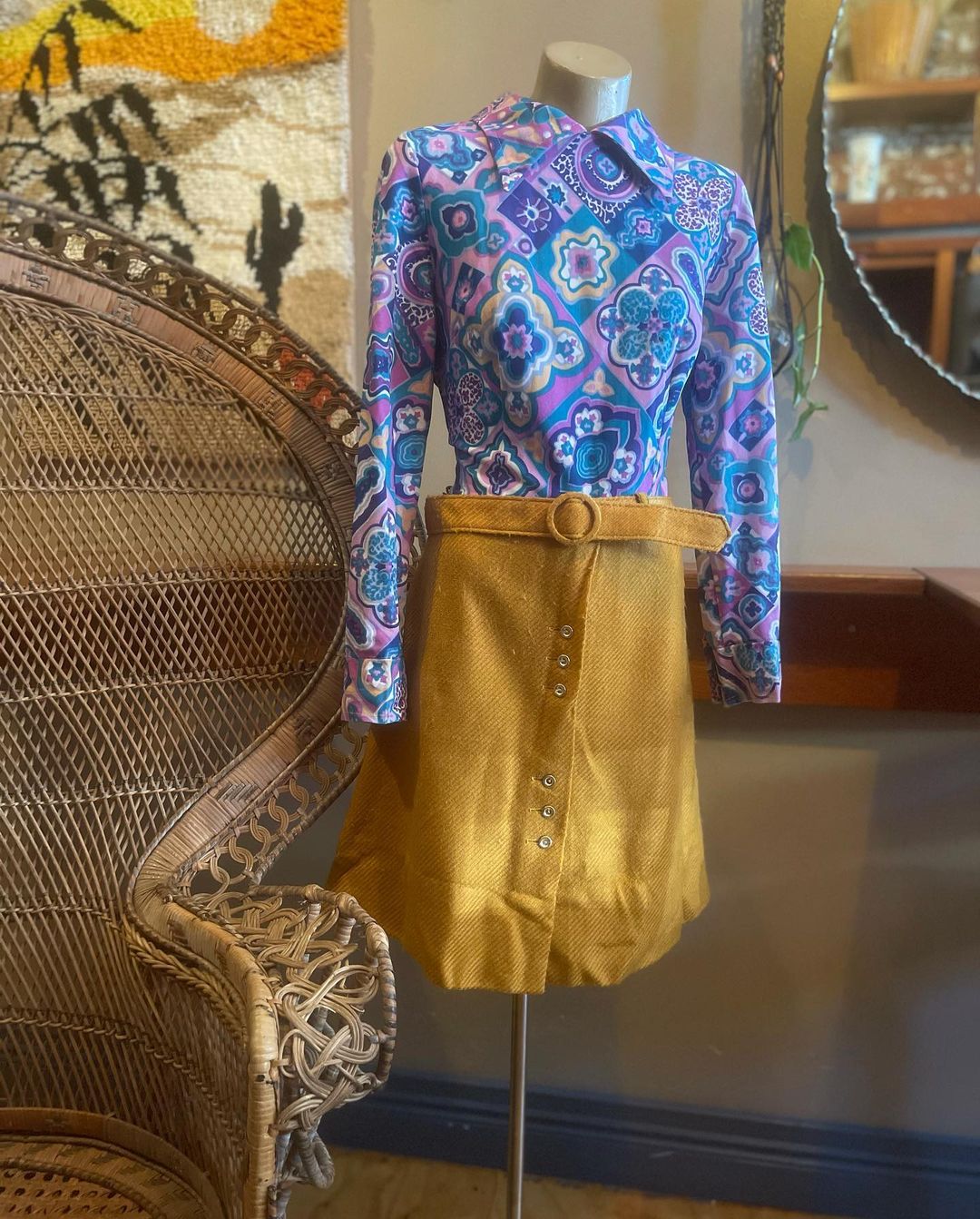 a vintage top and skirt on a clothing dummy