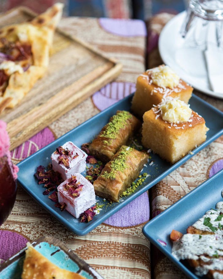 a plate of turkish desserts