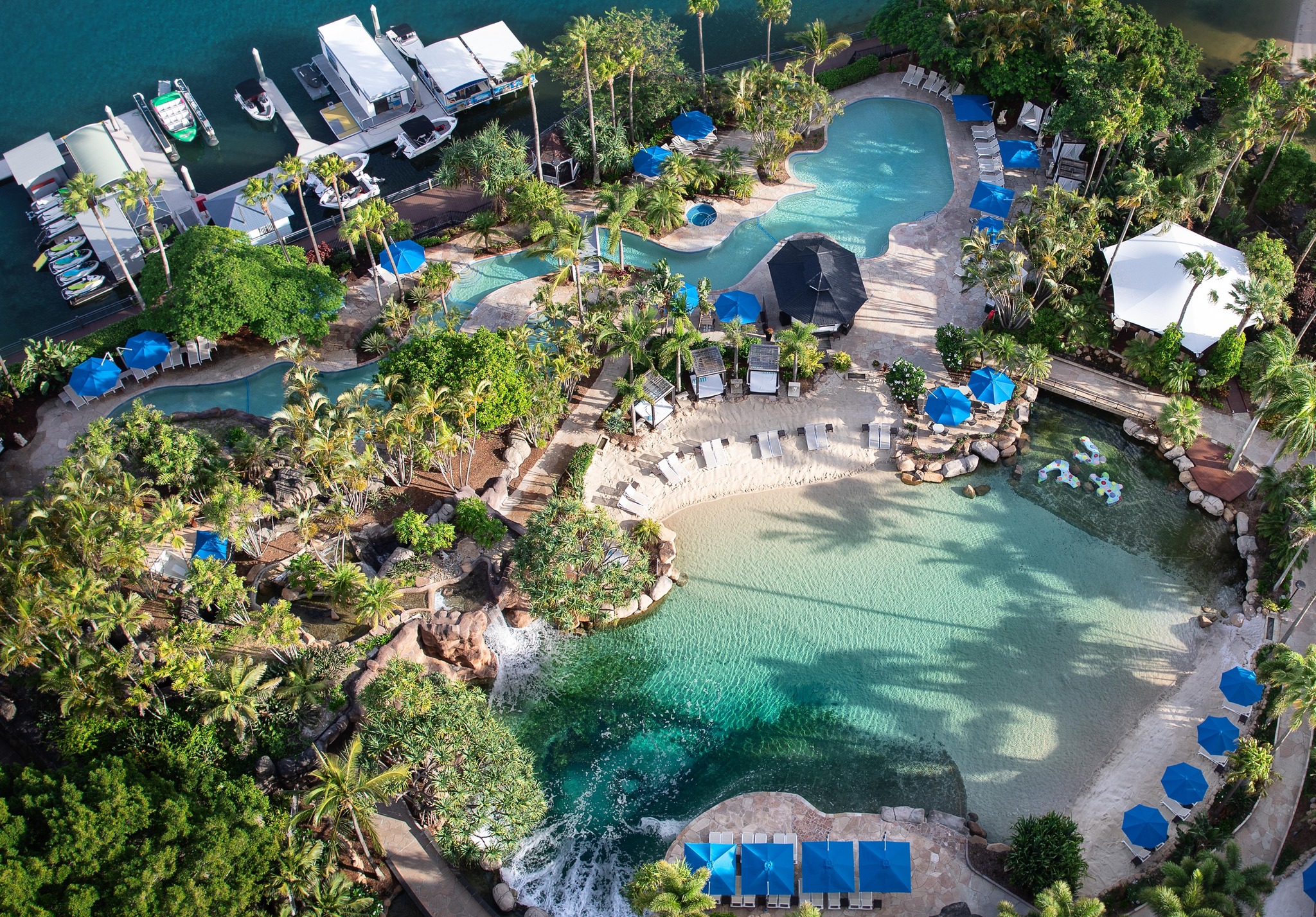 a large lagoon pool area seen from above