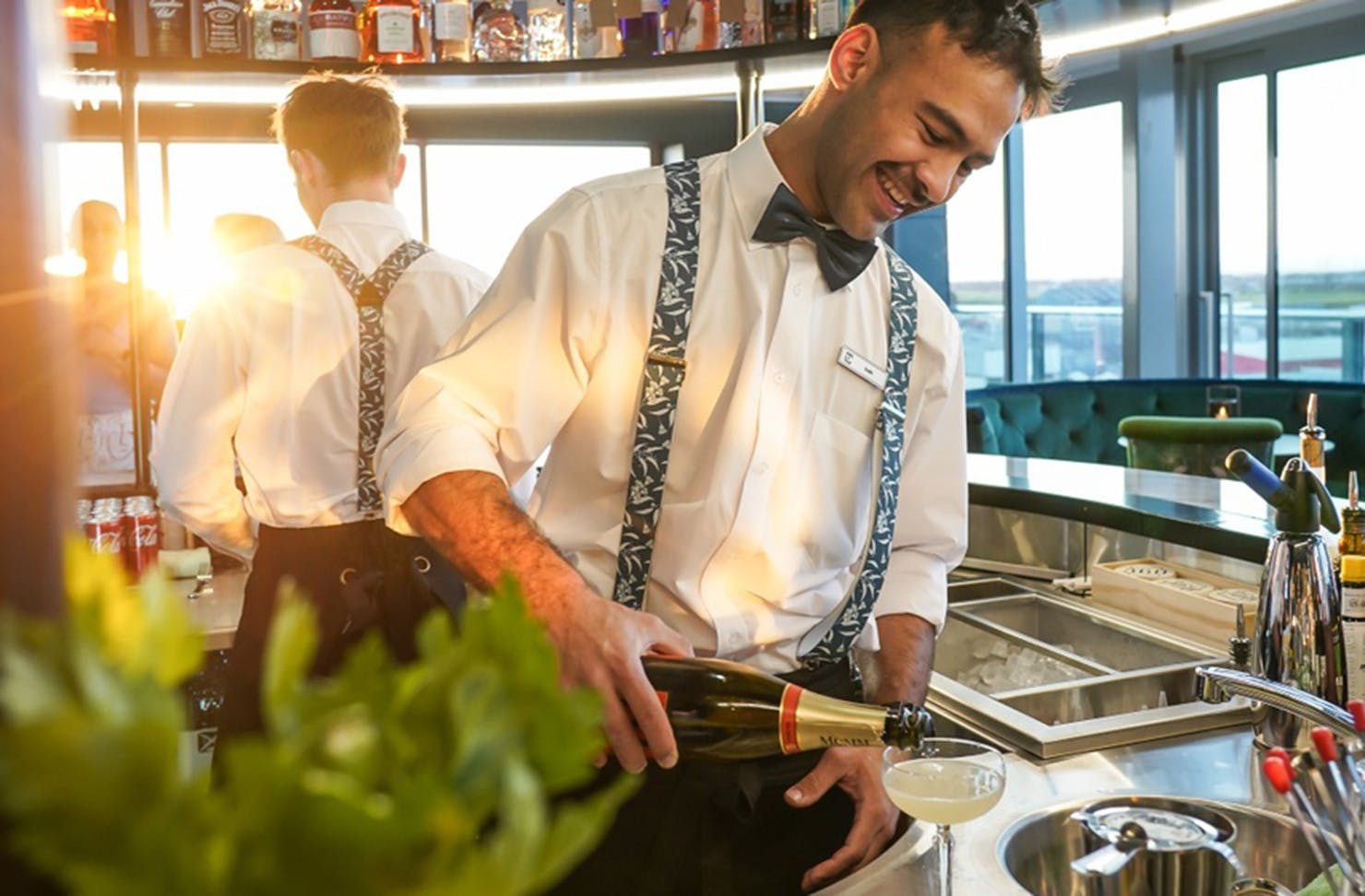 A bartender makes drinks at 360 at the Langlands.