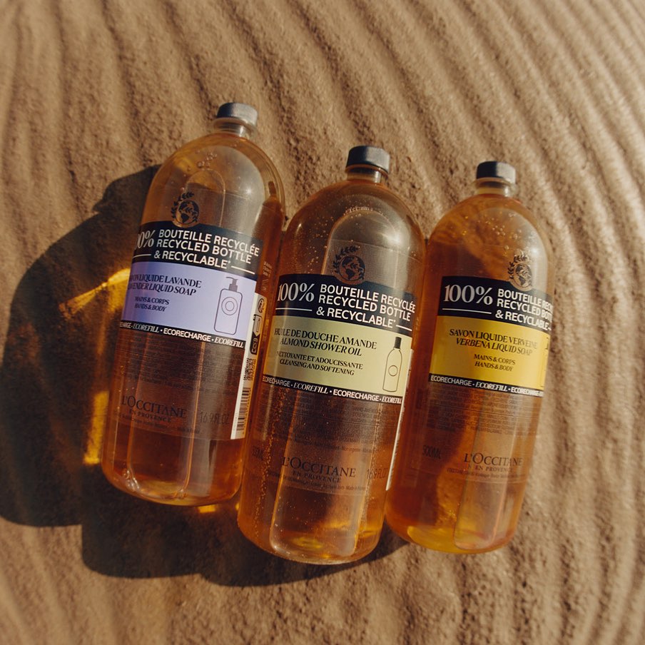 Three bottles on sand. 
