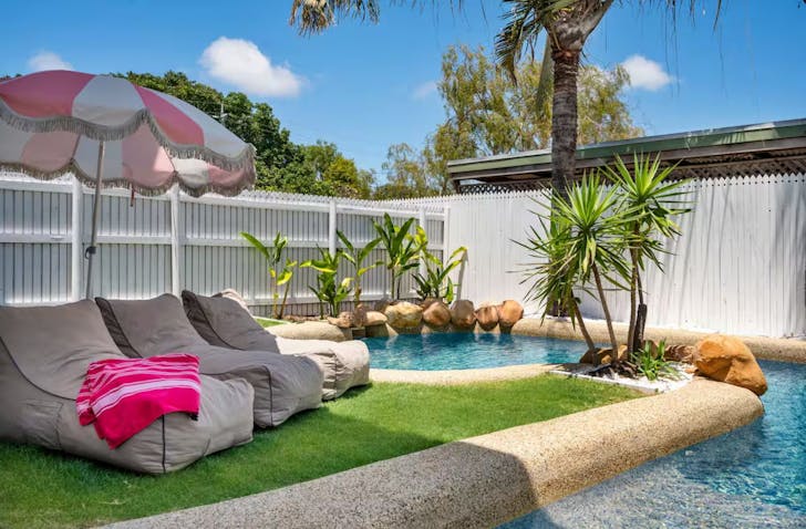 A view of the pool at 3 Palms Lagoon Pool Villa Airbnb Townsville 