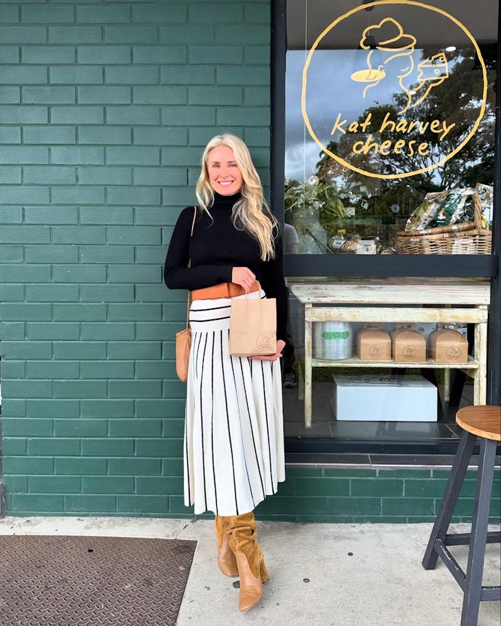 Magdalena Roze stands in front of Kat Harvey cheese store