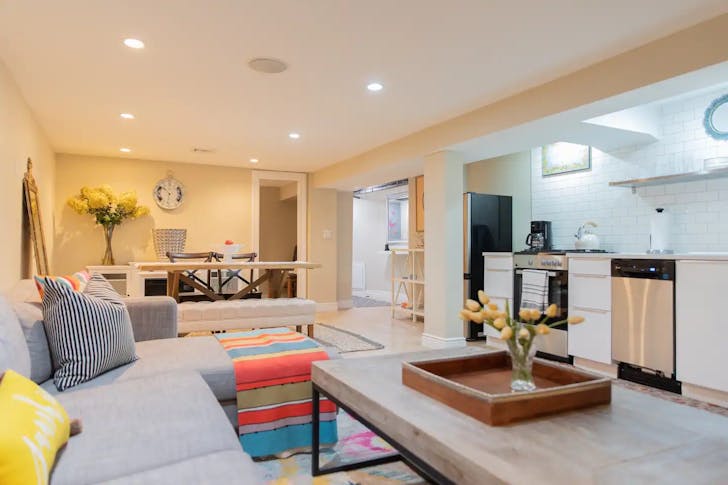 Couch and table behind kitchen