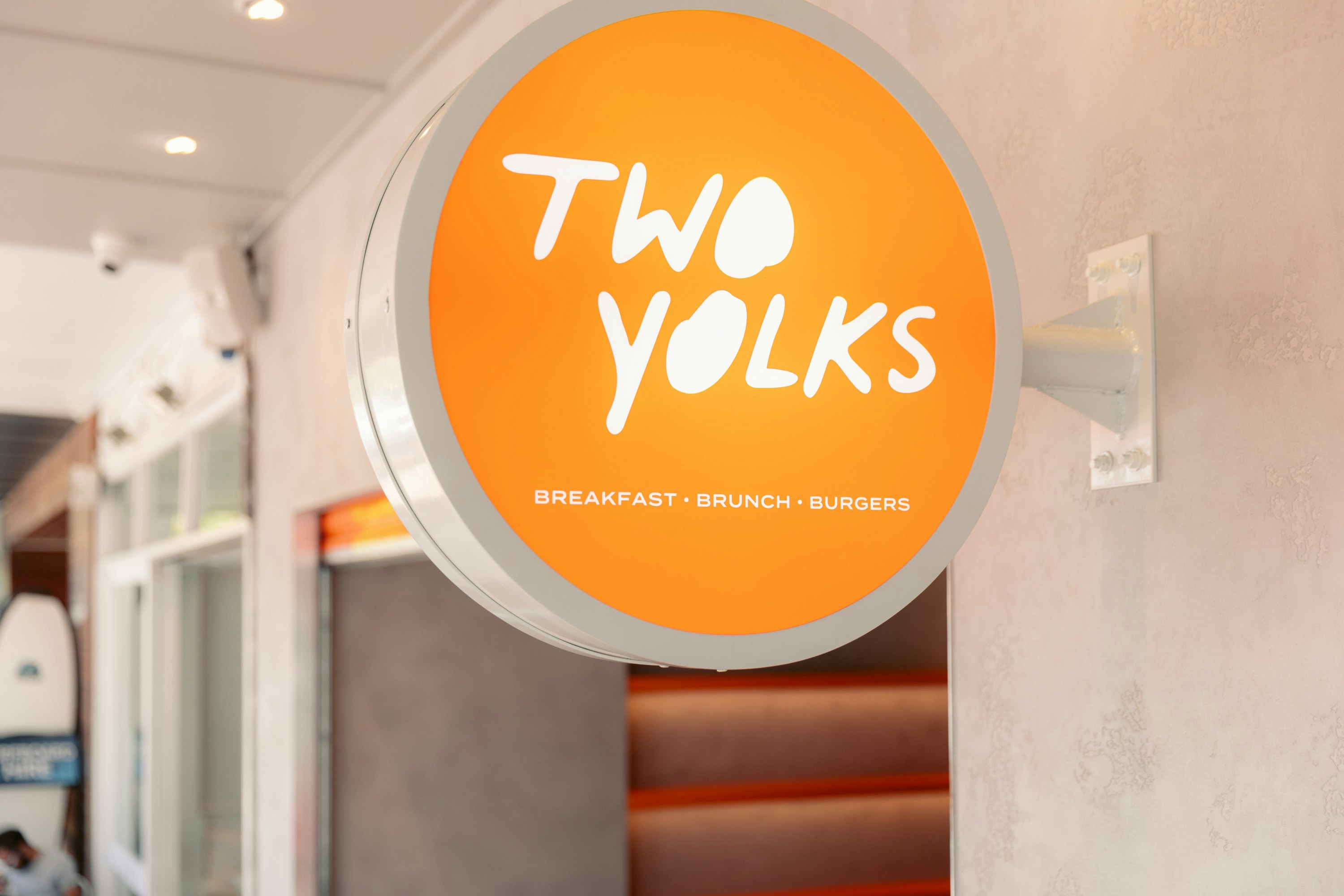 a sign that says 'two yolks'