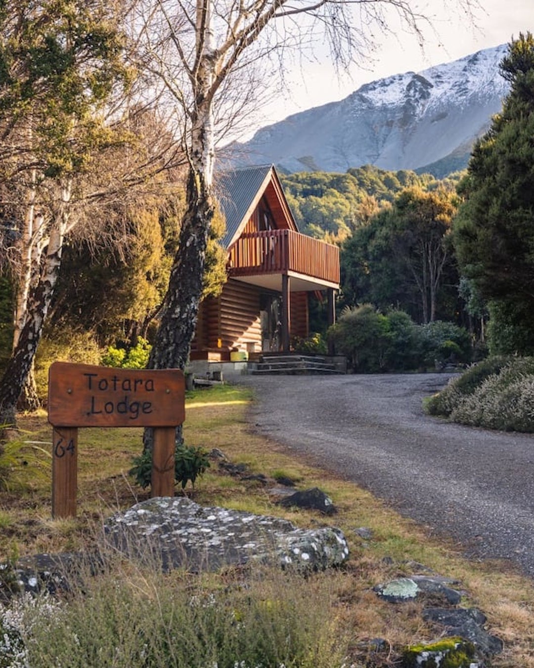 Totara Lodge is shown from the outside with a sign pointing to it.