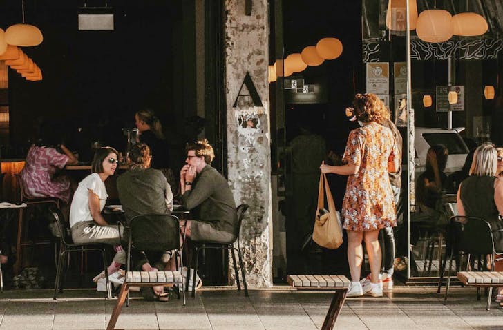 Group standing outside K Road restaurant Auckland