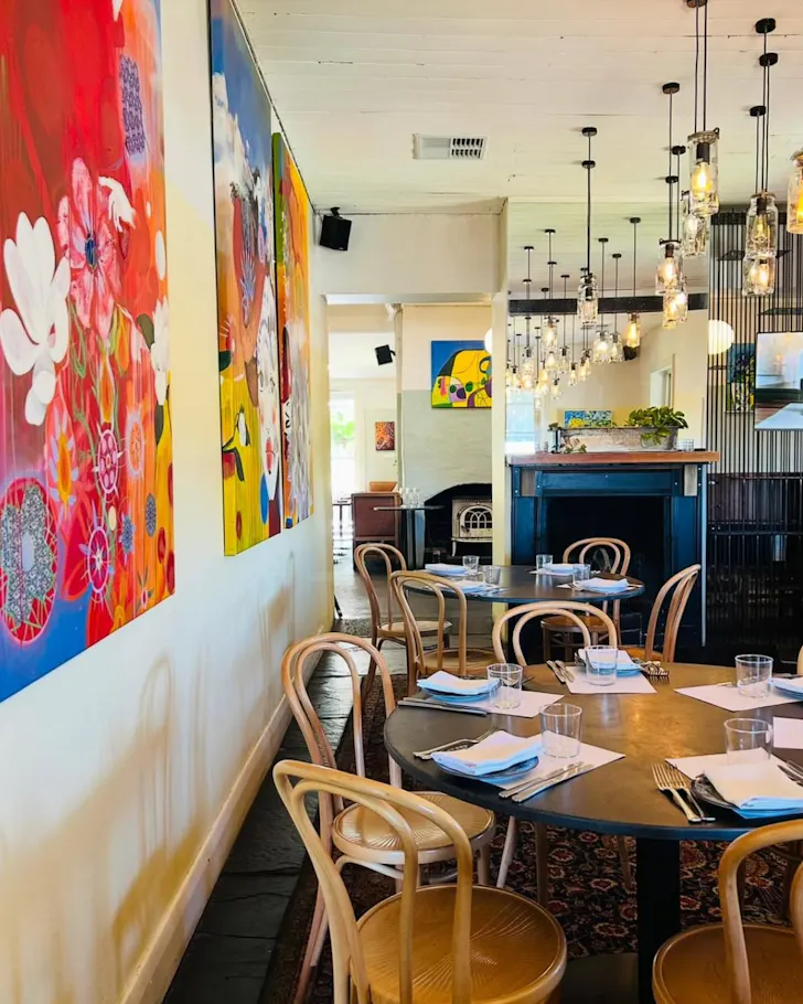 Colourful dining room with chairs and table