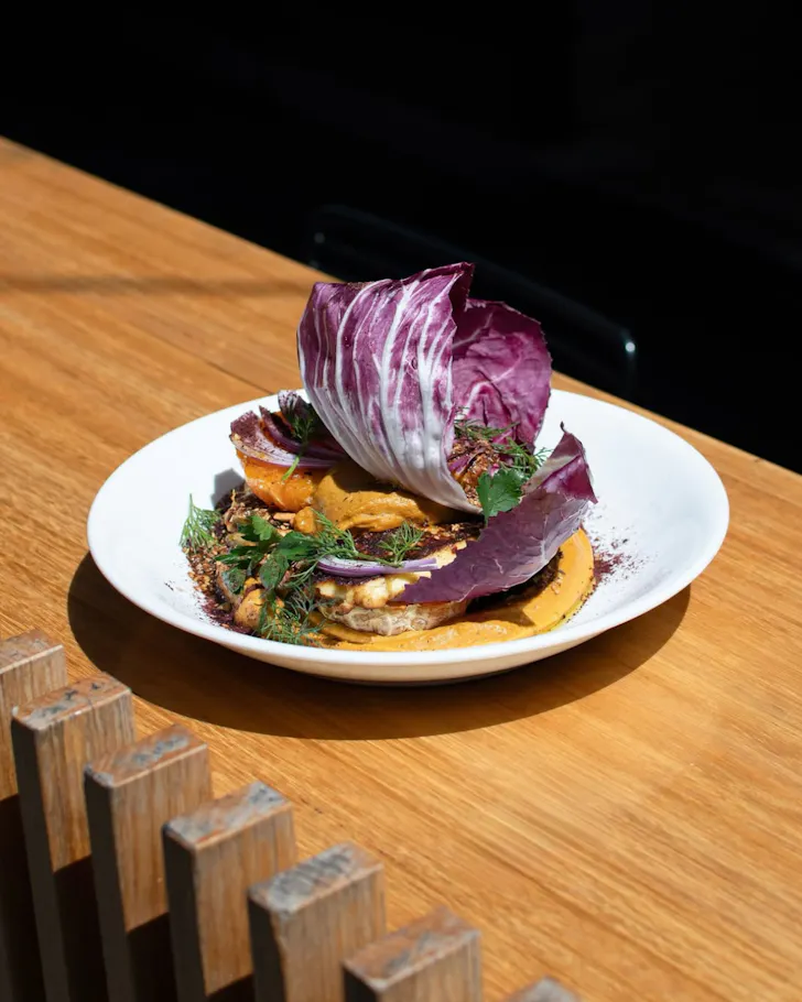 Plate of cabbage on wood table