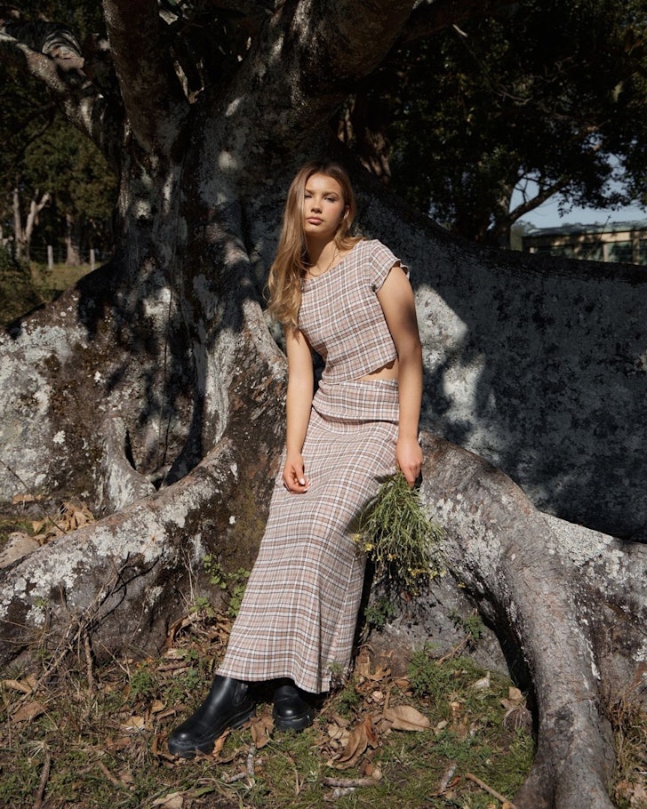 A model wears an outfit from AFENDS one of the best Australian fashion brands