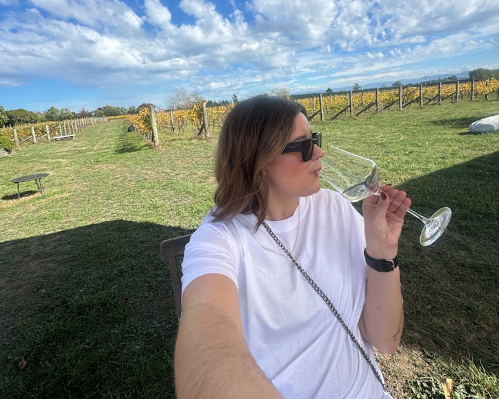 Person sipping wine