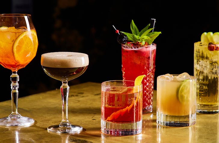 Zero alcohol cocktails lined up on a bar