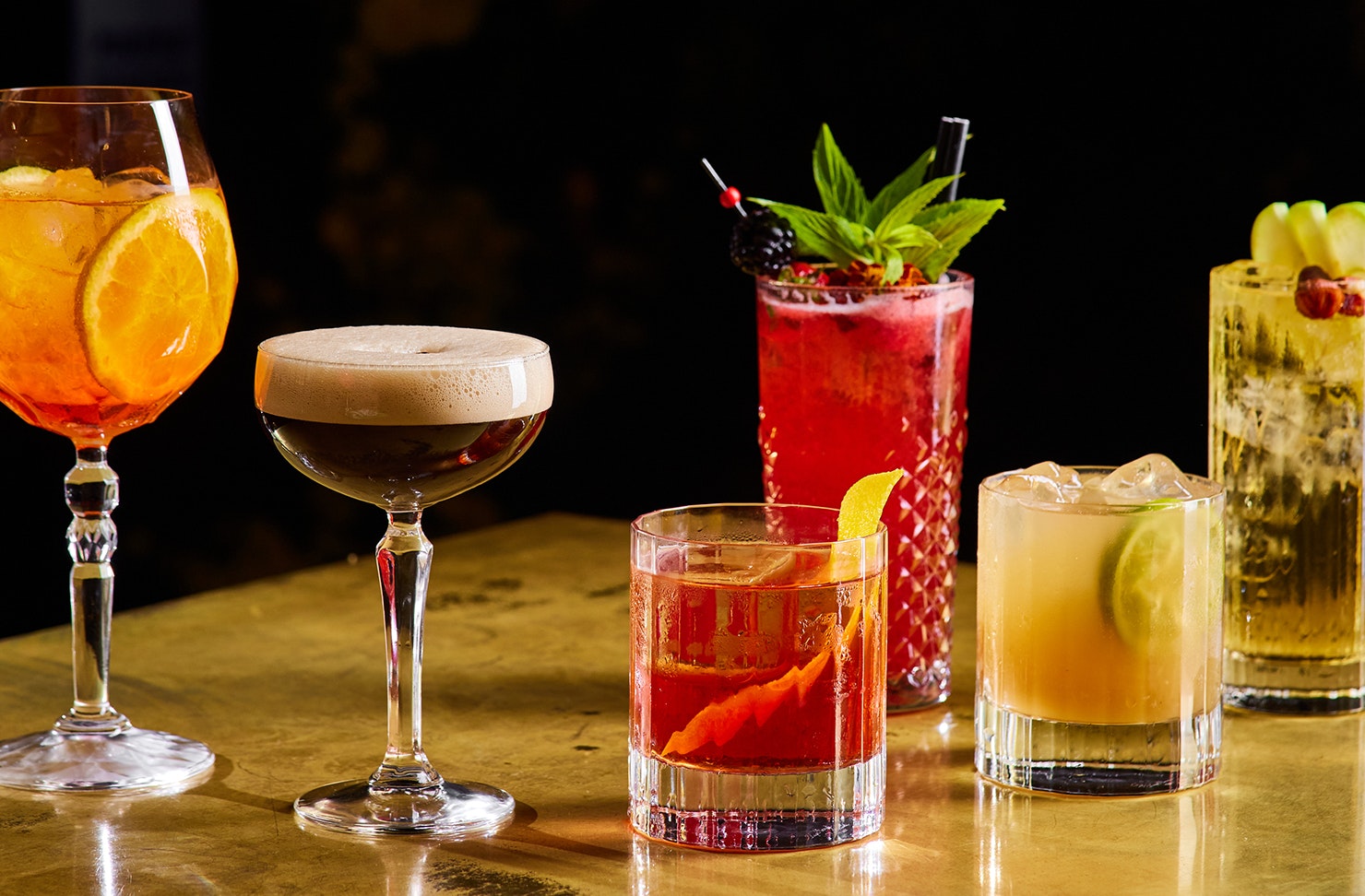 Zero alcohol cocktails lined up on a bar