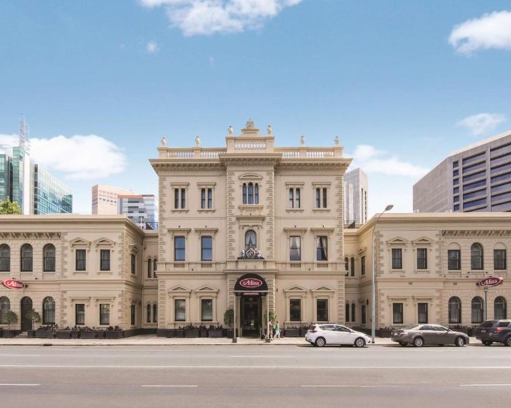 An exterior view of the historic Adina Apartment Hotel Adelaide Treasury one of the best Adelaide hotels