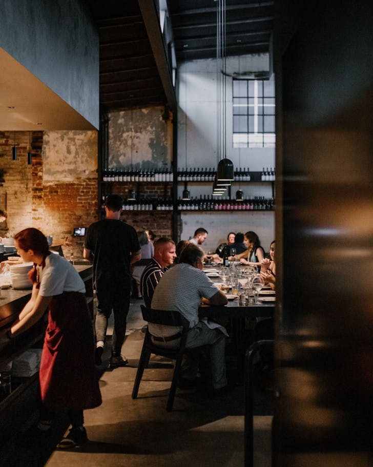 The industrial-chic dining room at Agnes, Brisbane.