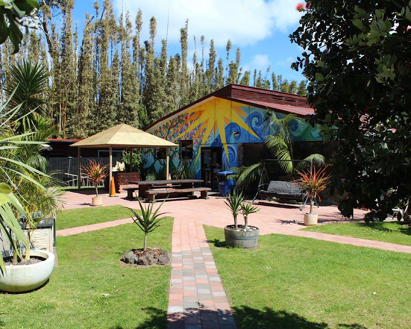 The brightly coloured main building at Ahipara Holiday Park. 