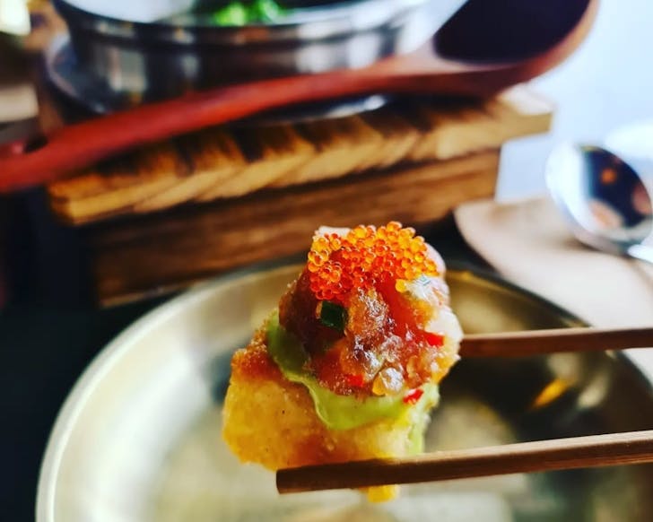 Crispy rice with spicy roe-spiked tuna tartare