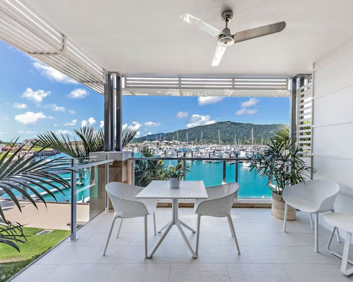 The view of the marina from the deck of Airlie Breezes at the Boathouse one of the best Airlie Beach Airbnbs