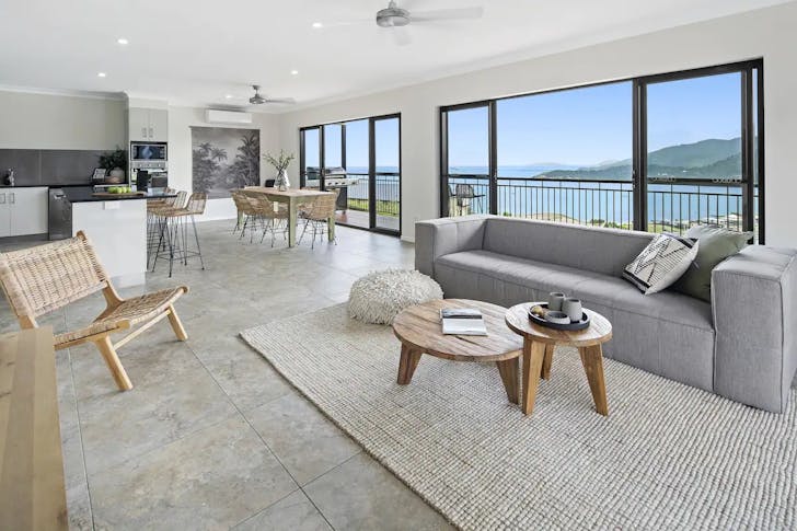 dining and entertainment area with view of the sea