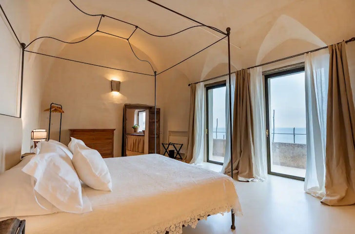 A bedroom at Alma Domus, one of the best airbnbs on the Amalfi Coast 