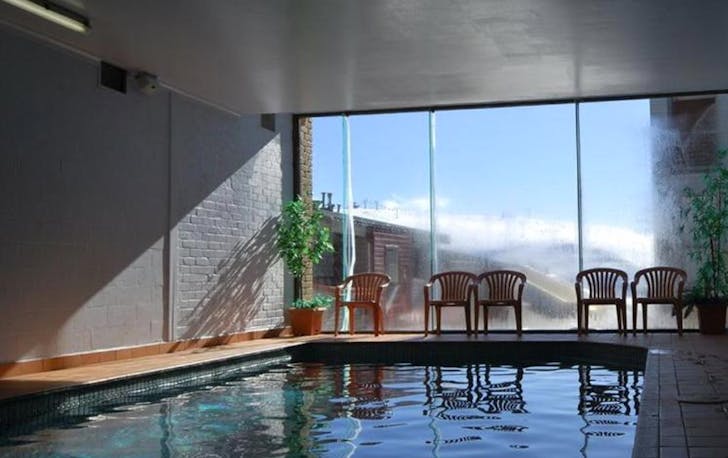 A sauna and pool room looking to the ski fields, a mt hotham accommodation.