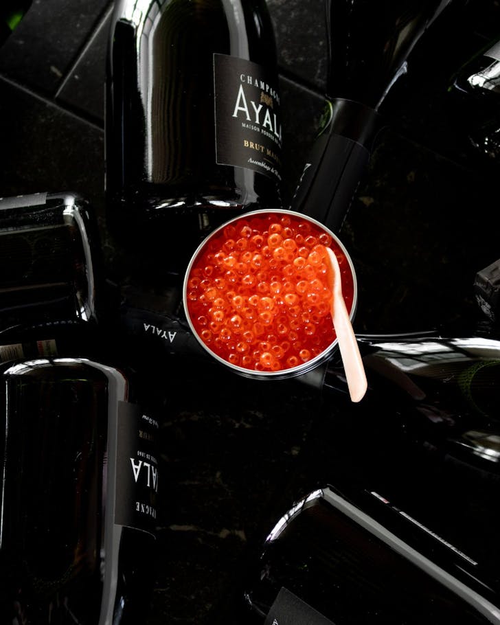 A pottle of salmon caviar at HISO Rooftop Bar