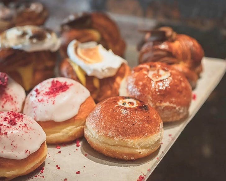 A whole lot of assorted doughnuts at Amano