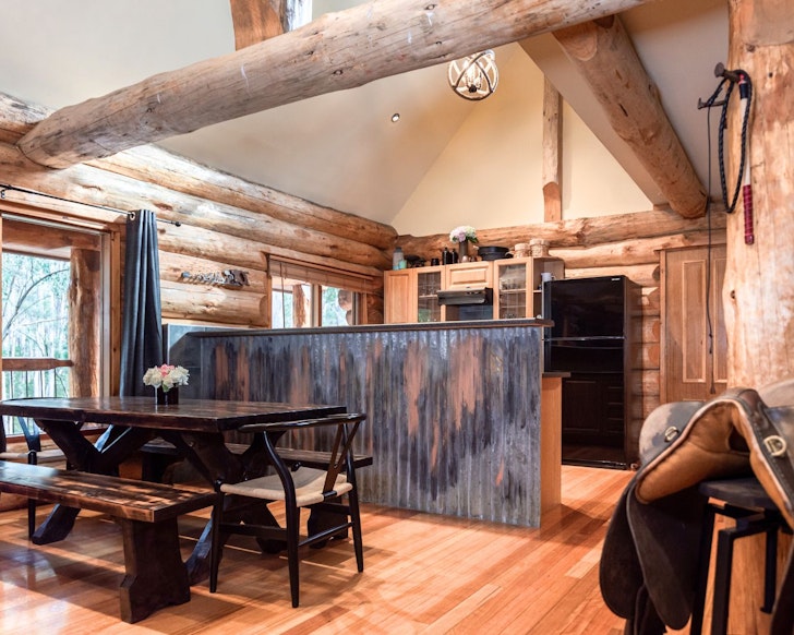 The dining space at Amaruq Log Cabin best Victoria snow getaways