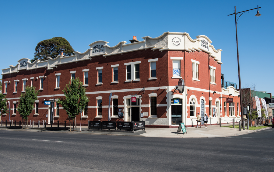 A large old building on a corner, The American Hotel in Echuca. 