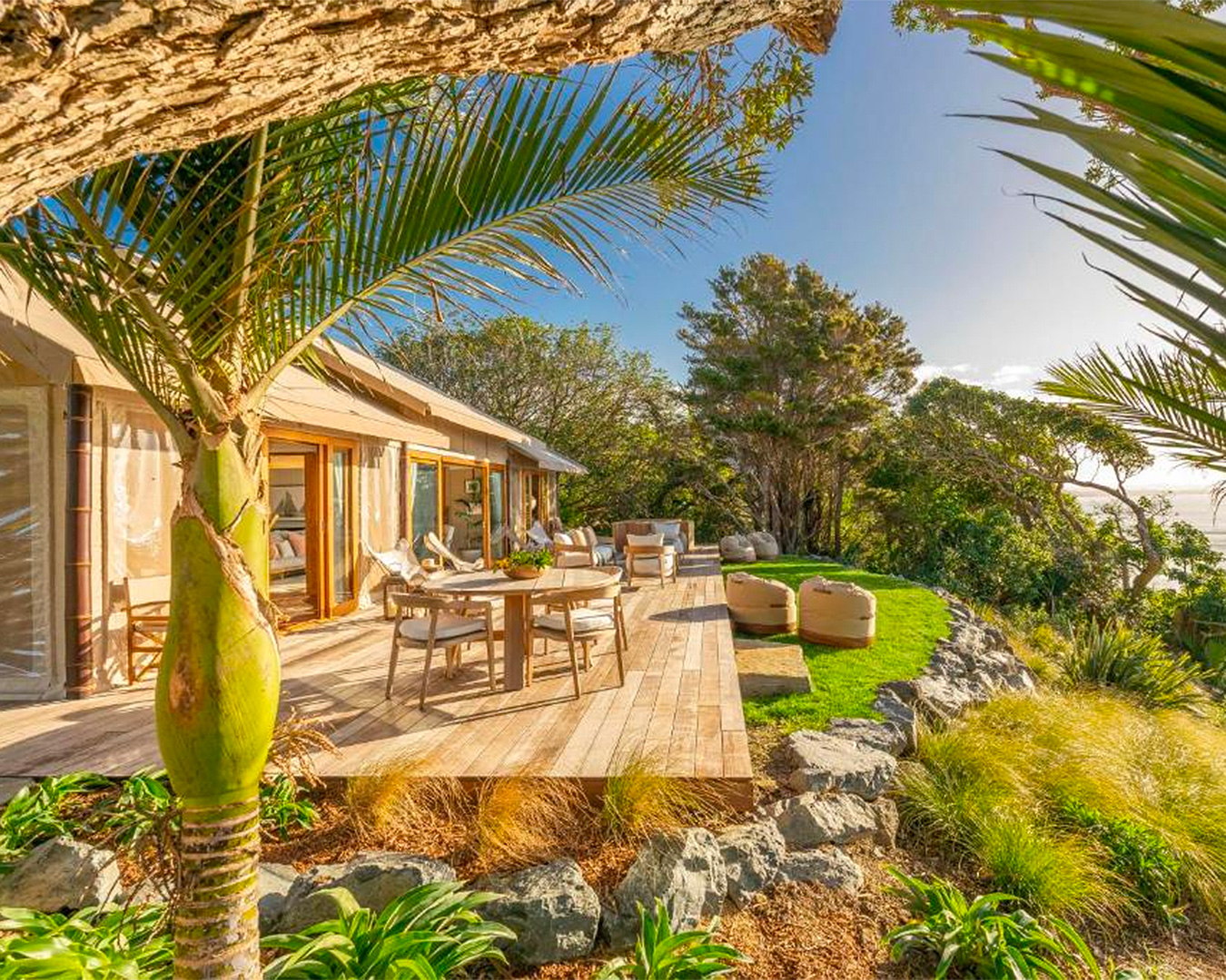An expansive deck at Andersons Cove is shown on a bright and sunny day in Langs Beach.