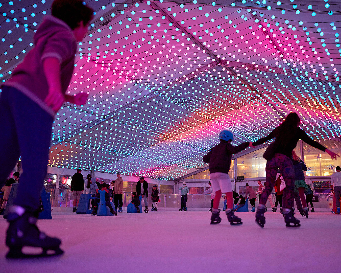 People have fun on the ice at Aotea Square Ice Rink