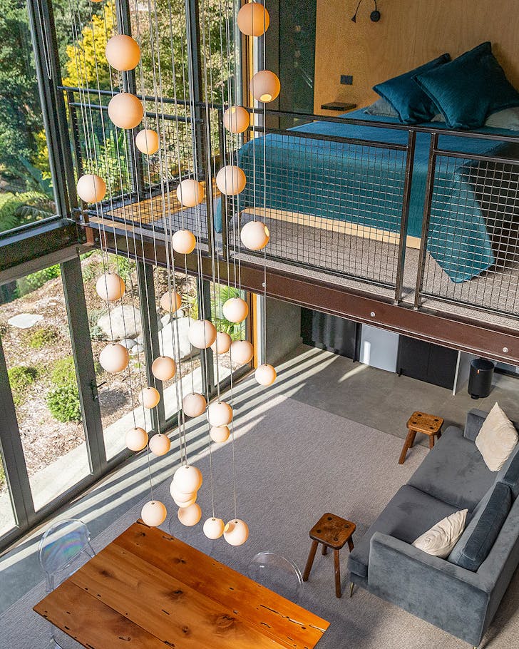 Pretty loft bed and a cascade of lights in one of the best airbnbs in Tauranga. 