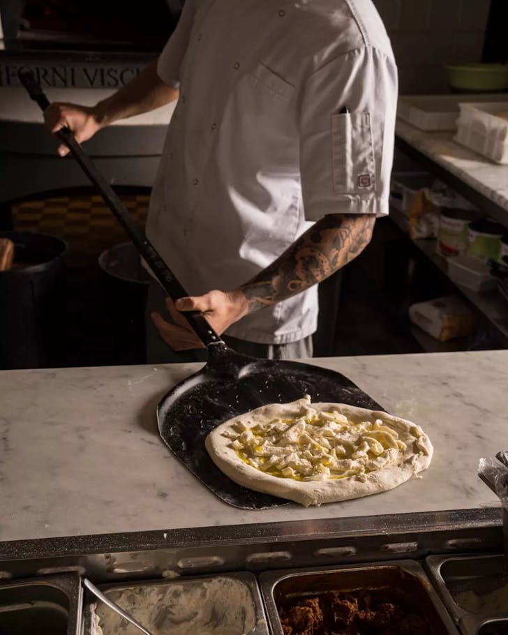 Wood-fired pizza Matteo Downtown