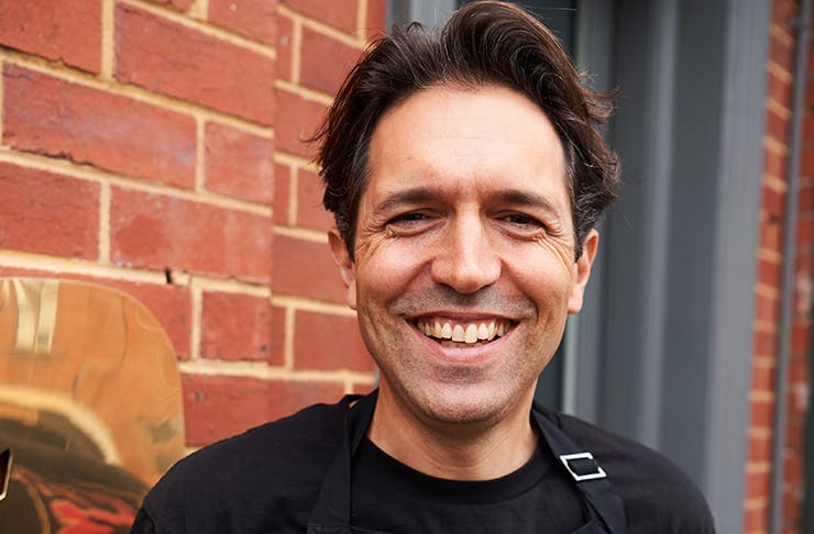A photo of Attica owner/chef Ben Shewry smiling. 
