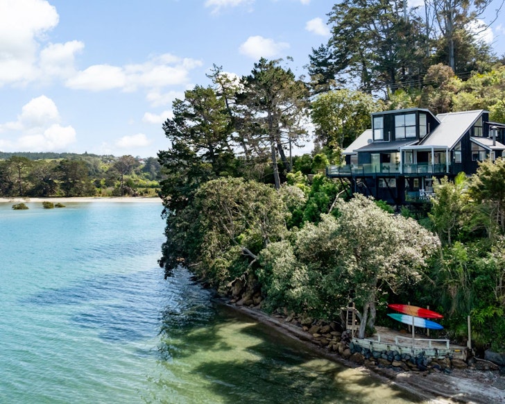 An exterior view of Auckland Beachfront best beach house Airbnbs NZ