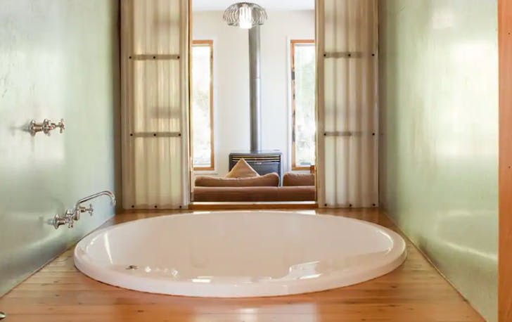 A large spa bathroom in the middle of a Airbnb Victoria. 