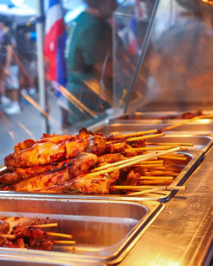 Chicken skewers in heat tray